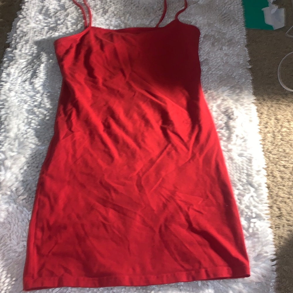 Plain red size M bodycon dress from H&M. Too small to wear